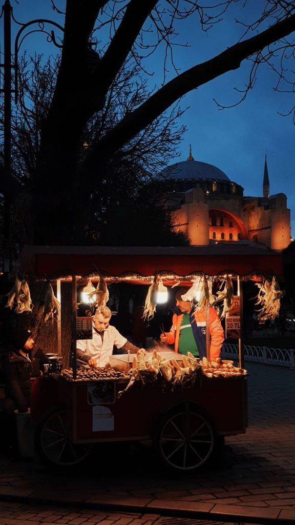 Street food vendor near Hagia Sophia in Istanbul at evening time.
